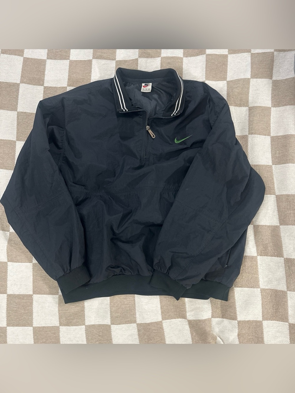 Vintage Nike Black Pullover Windbreaker with Green Swoosh Accent